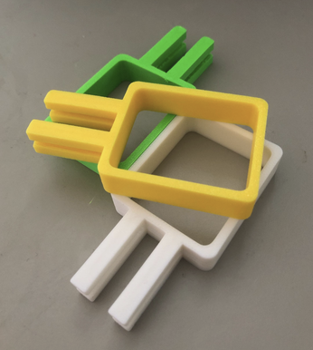 Pack of 3 car vent sauce holders in green, yellow and white showing the clip design